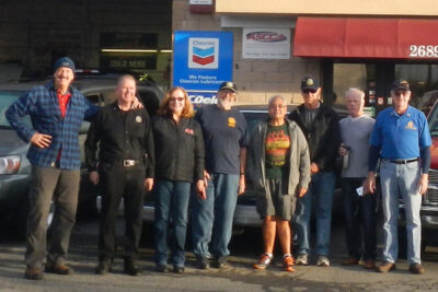 Rotary club members gathered outside a local business