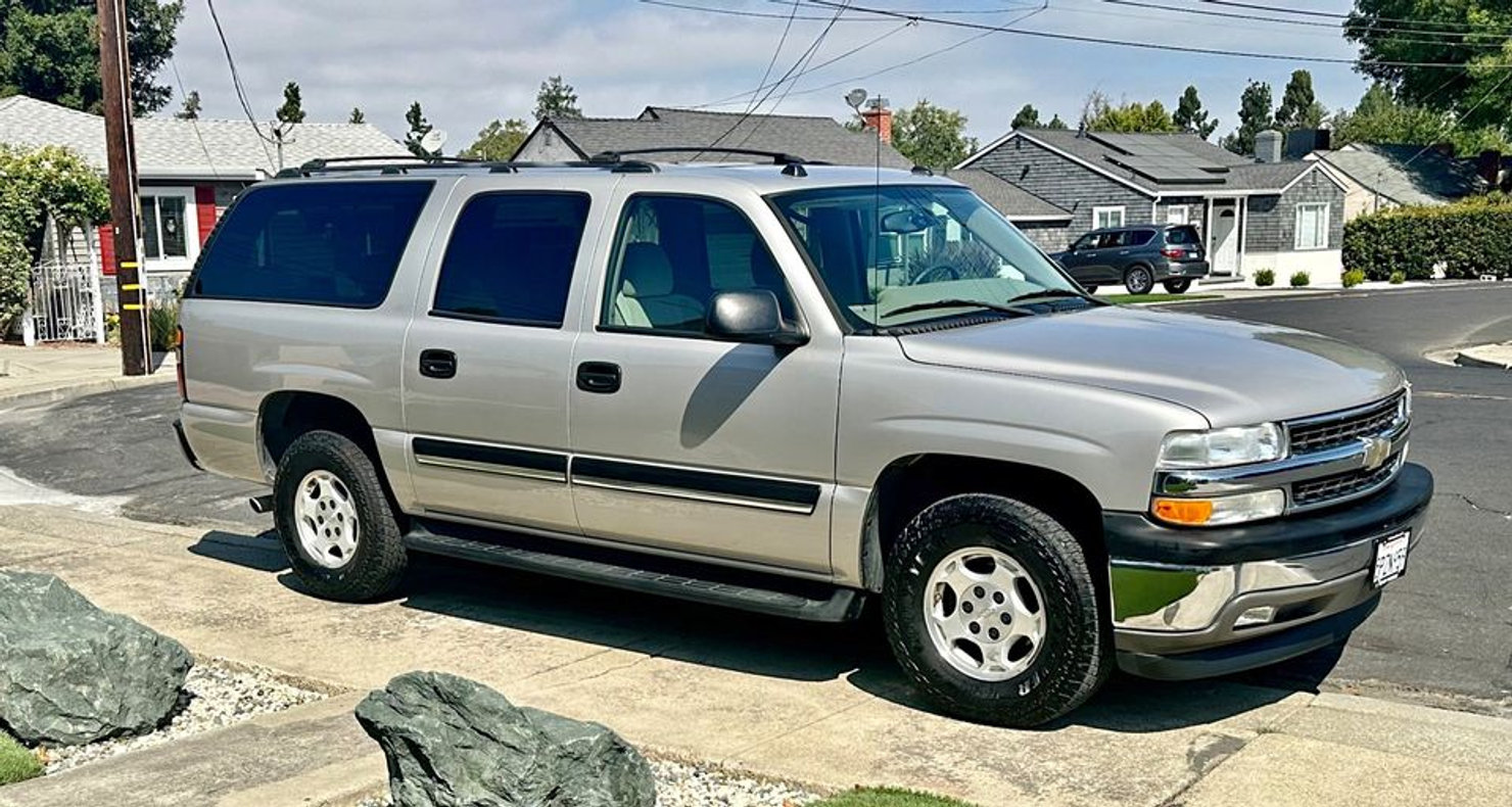 A donated car parked outside, ready for pickup